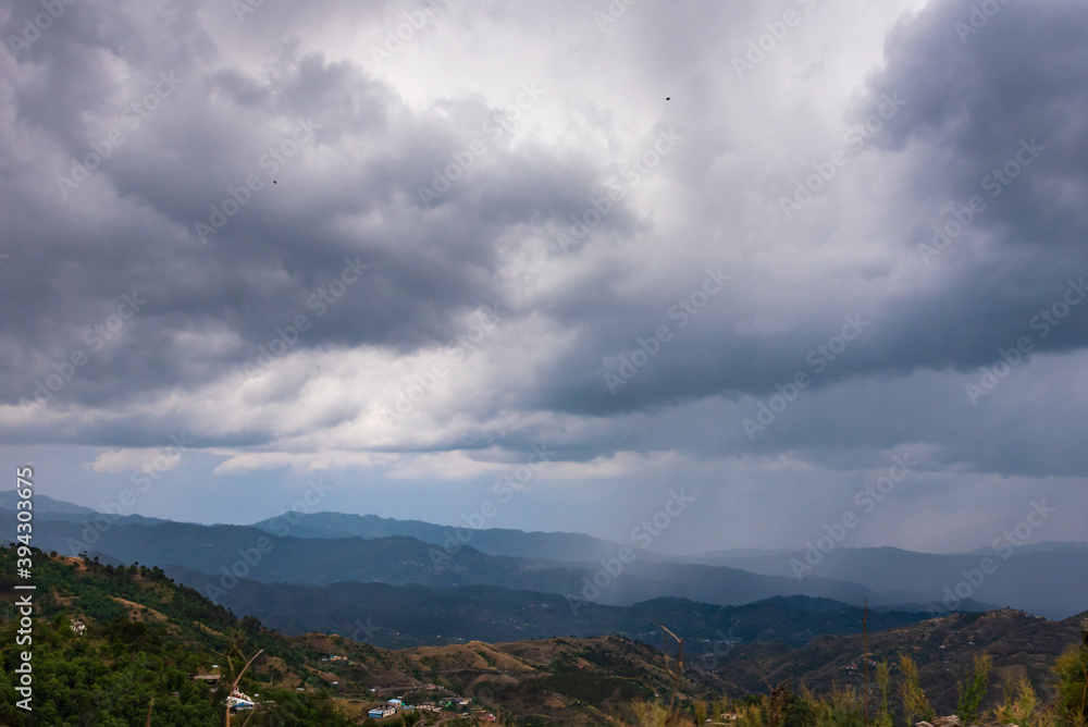 Overcast sky over lower himalayas mountains from Shimla Highway near Barog, Himachal Pradesh. It is a popular hill station for holidays in India