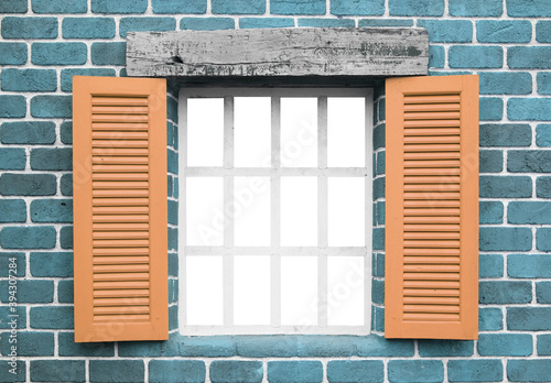 wooden window on brick wall