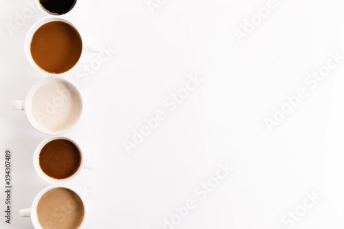 cups of coffee on white background with color gradient of coffee