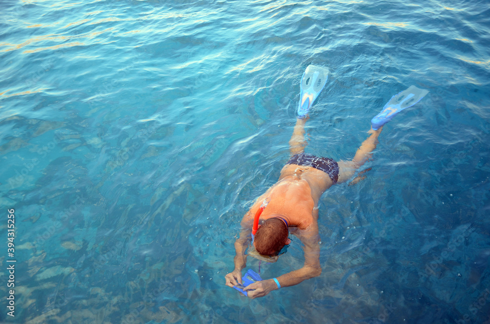 Mature man diving in Red Sea - Egypt, Sharm El Sheikh