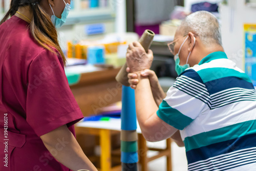 Occupational therapy: hand function training in stroke patient by using stacking cone at a therapy room in the hospital