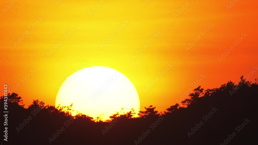 View of setting sun. View of setting sun.