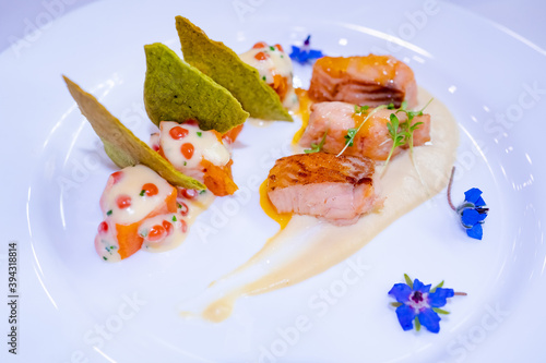 White plate with fish dish ...