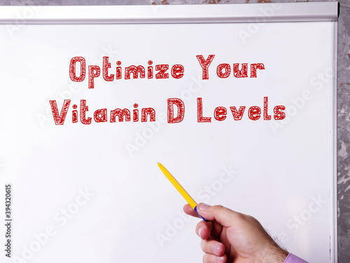 Lifestyle concept about Optimize Your Vitamin D Levels with inscription on the page. photo