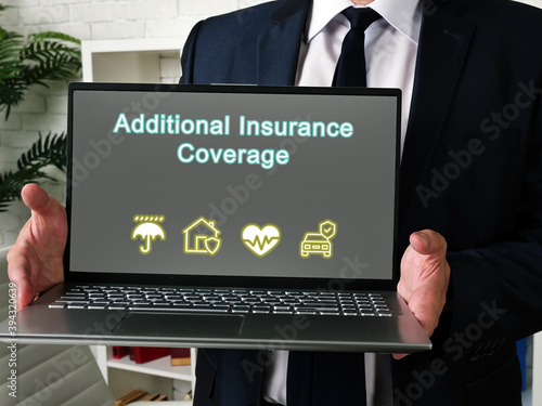 Fotografija Business concept meaning Additional Insurance Coverage with phrase on the piece of paper