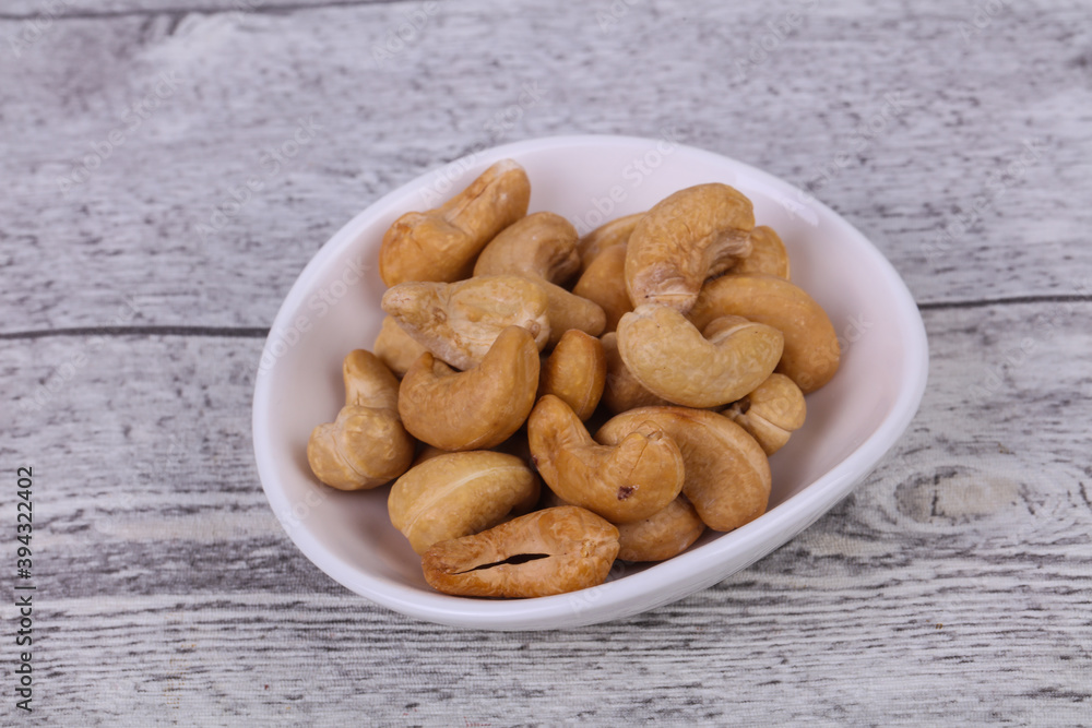 Cashew nuts heap in the bowl Cashew nuts heap in the bowl