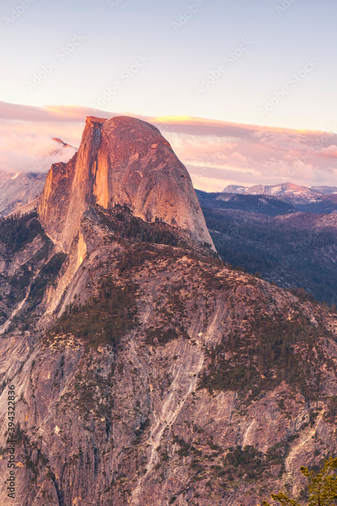 Fototapeta premium Half Dome at sunset seen from the Glacier Point Overlook in Yosemite National Park