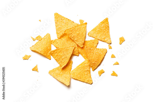 Golden nachos chips isolated on white background. top view photo
