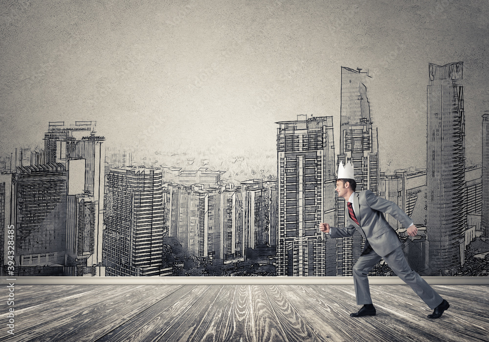 King businessman in elegant suit running and drawn cityscape silhouette at background King businessman in elegant suit running and drawn cityscape silhouette at background
