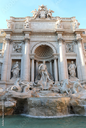Trevi fountain with the God Neptune in the center in the city of