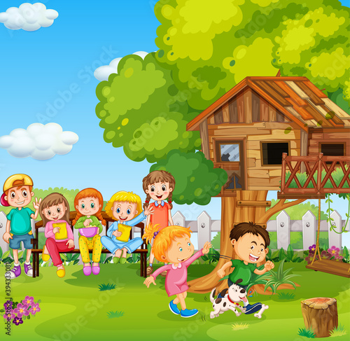Children playing in the park with a dog