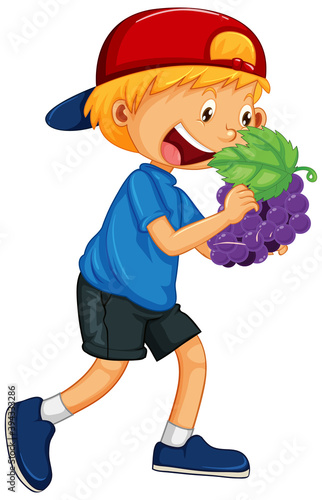 Happy boy holding grape