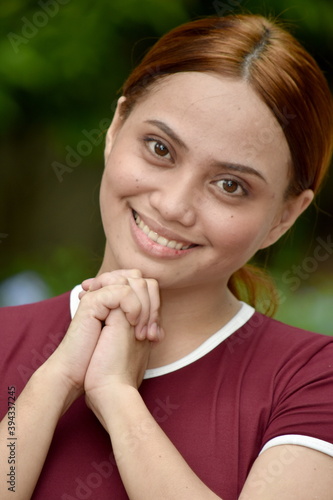 Appreciative Pretty Adult Female Wearing Tshirt