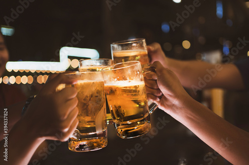 Fotografie Asian friends Drinking beer outdoors at the brewery for the New Year festival