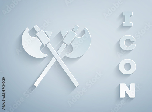 Paper cut Crossed medieval axes icon isolated on grey background. Battle axe, executioner axe. Medieval weapon. Paper art style. Vector.