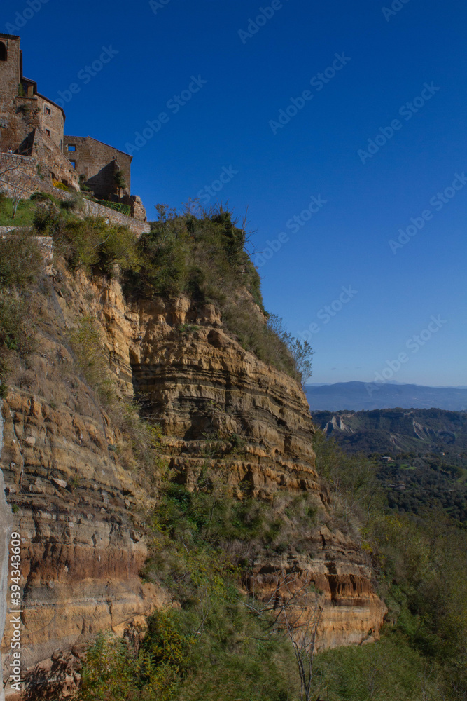Pattern layers of Civita di Bagnoregio hill town,two different formations of rocks,ancient formation is clay and The top layers are made up of tuff and lava material.formed by landslides and erosion.