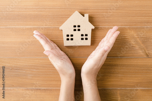 Home idea in human hand dream to sweet family