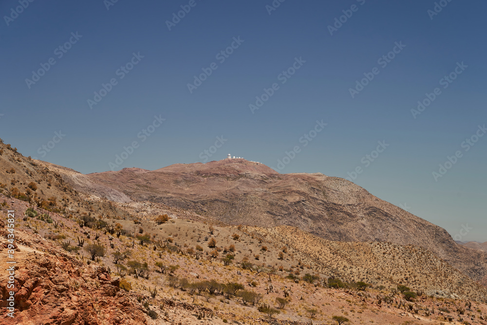 observatory located high on mountain in the dry and arid landscape of the atacama desert in Chile, South America observatory located high on mountain in the dry and arid landscape of the atacama desert in Chile, South America