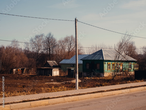 one-story house in a small town in spring