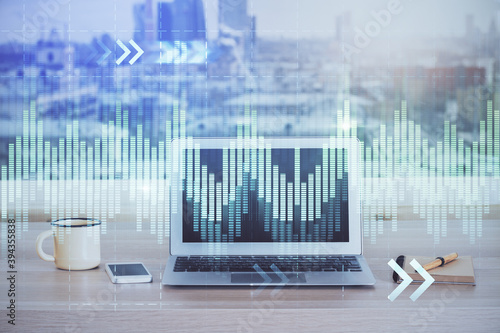 Multi exposure of business theme icons and work space with computer background. Concept of success.