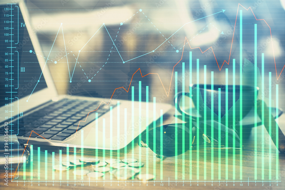 Multi exposure of chart and financial info and work space with computer background. Concept of international online trading. Multi exposure of chart and financial info and work space with computer background. Concept of international online trading.