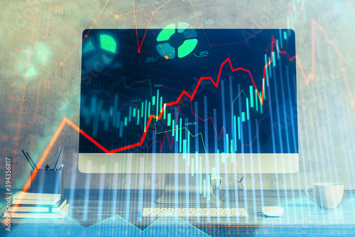 Stock market graph and table with computer background. Multi exposure. Concept of financial analysis. © peshkova