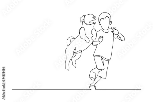 Continuous line drawing of happy little boy playing with dog pet. One line art concept of happy childhood. Vector illustration	