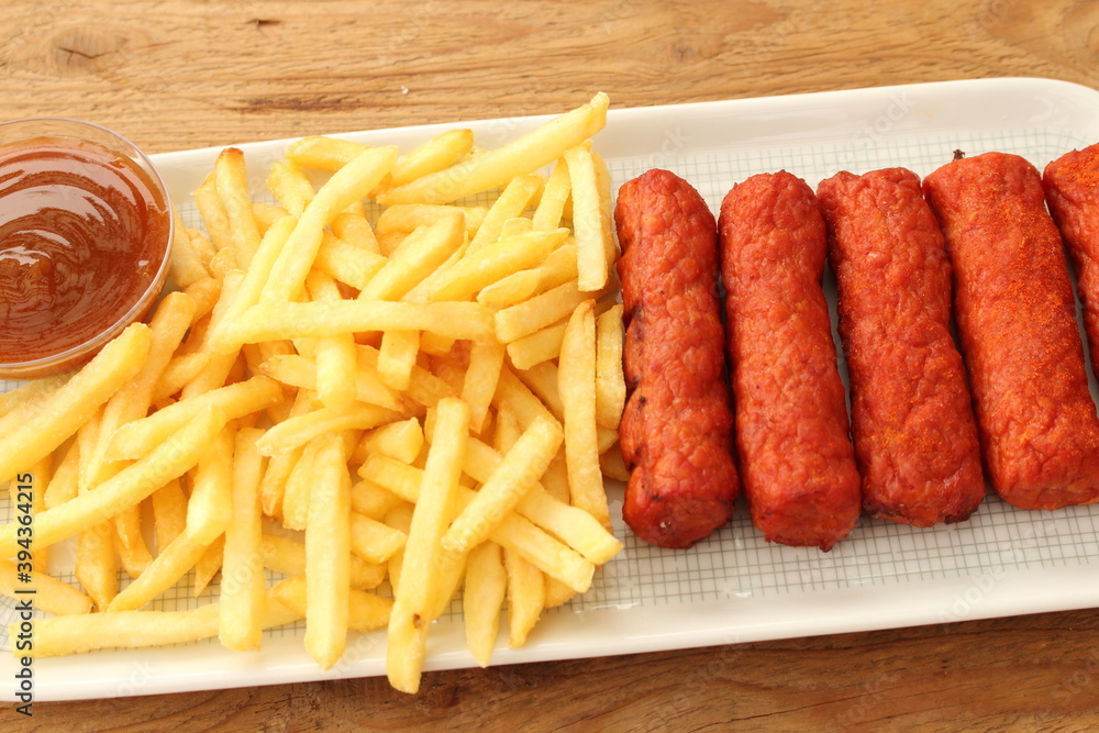 delicious french fries with cevapcici rolls and dip delicious french fries with cevapcici rolls and dip