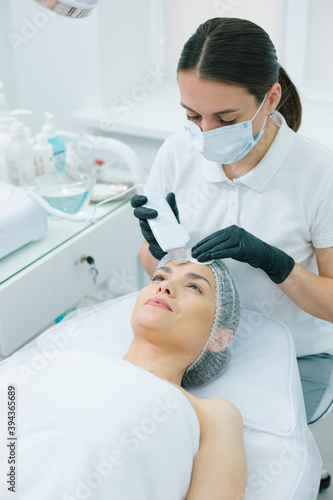 Professional skin treatment in modern beauty clinic