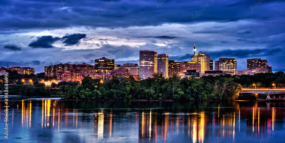 Rossyln, Arlington, Virginia, USA downtown city skyline at dusk on the Potomac River.