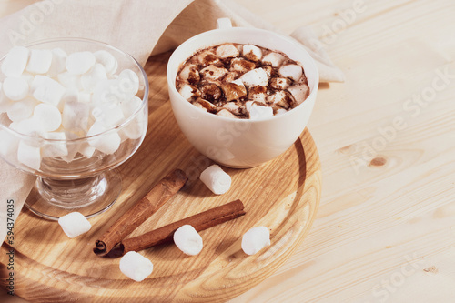 tasty sweet hot chocolate in a cup and mini marshmallows