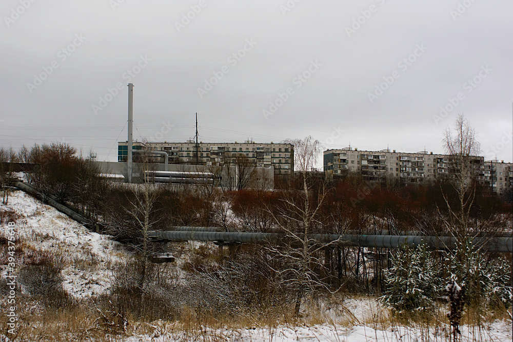 Obraz premium residential buildings and a boiler house on the outskirts of the city