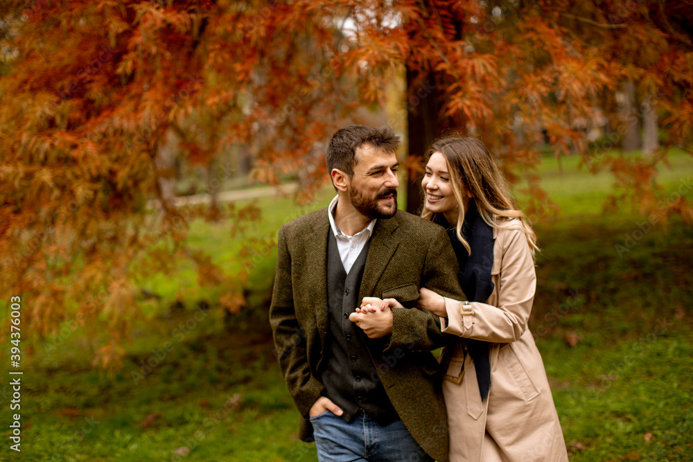 Young couple in the autumn park Young couple in the autumn park
