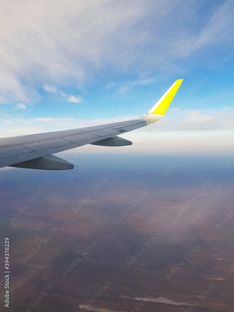 Wing aircraft in the blue sky
