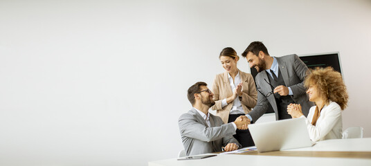 Multiethnic young business people working together in the office