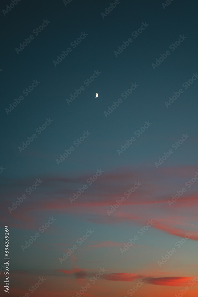 Crescent moon after sunset on a beautiful sky Crescent moon after sunset on a beautiful sky