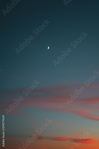 Crescent moon after sunset on a beautiful sky