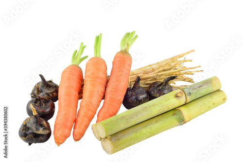 Maogen, bamboo cane, carrot, Water-chestnuts on the white background. photo