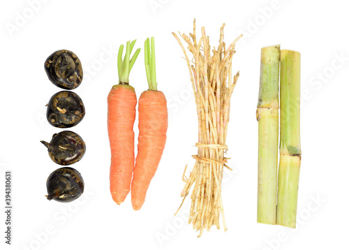 Maogen, bamboo cane, carrot, Water-chestnuts on the white background.