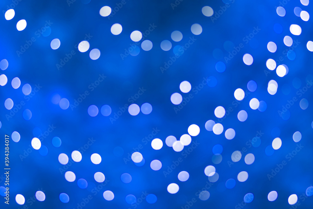 blue background abstract image with bokeh lights Celebrate the Festival of Love, Christmas and New Year the day of happiness for everyone.