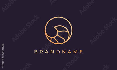 circle with line forming sea wave and with gold color