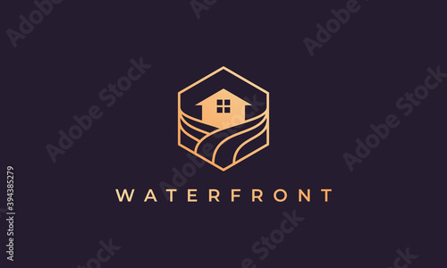resort logo with a hexagon base shape with ocean wave and window