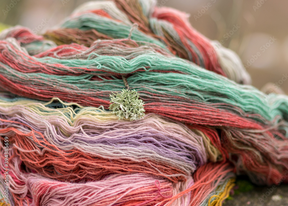 colored wool yarn skeins on a fuzzy background, handicraft concept, hand knitting, autumn time, handicrafts colored wool yarn skeins on a fuzzy background, handicraft concept, hand knitting, autumn time, handicrafts