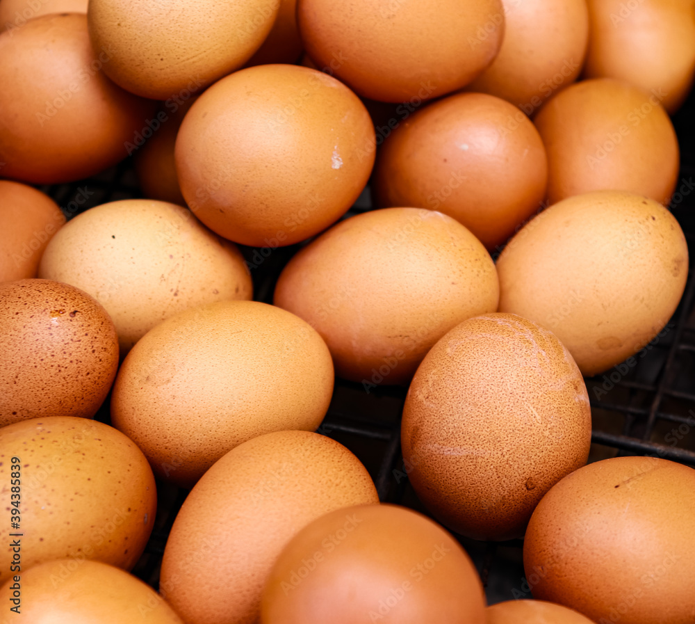 several fresh chicken eggs on a grille. Healthy eating concept several fresh chicken eggs on a grille. Healthy eating concept