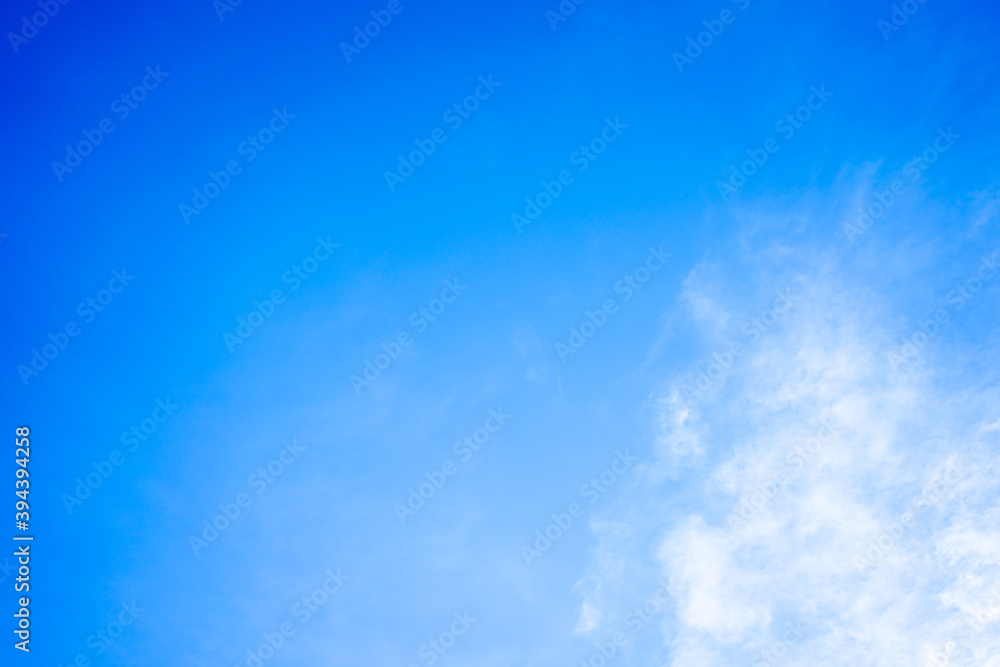 White clouds on blue sky with copy space for banner or wallpaper background. freedom concept White clouds on blue sky with copy space for banner or wallpaper background. freedom concept
