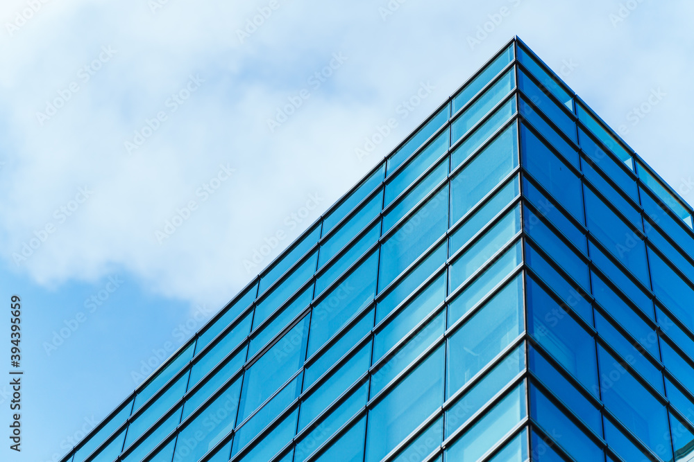 underside panoramic and perspective view to steel blue glass high rise building skyscrapers, business concept of successful industrial architecture