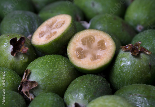 Green feijoa fruit (Acca sellowiana) background pattern. photo