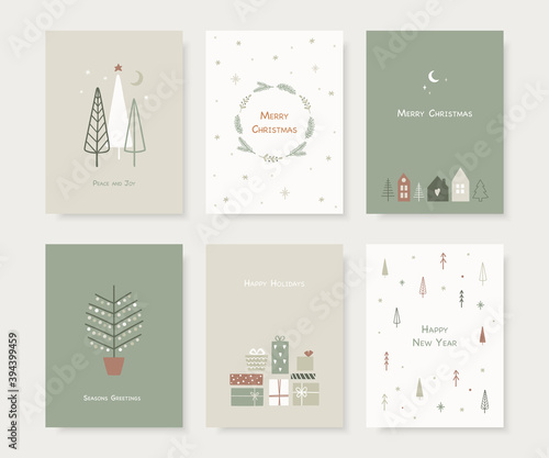 Set of hand drawn Christmas greeting cards. Trendy hand drawn christmas trees, snowflakes, gift box and cute houses in scandinavian style. Vector illustration.