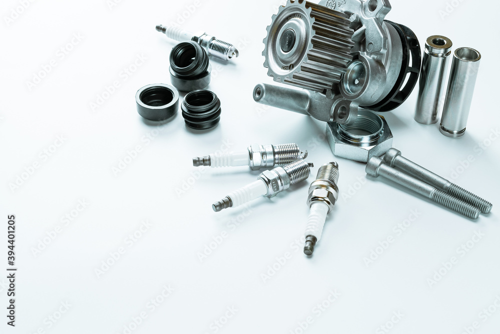 Car construct. Set of new metal car part. Auto motor mechanic spare or automotive piece isolated on white background. Technology of mechanical gear. Car construct. Set of new metal car part. Auto motor mechanic spare or automotive piece isolated on white background. Technology of mechanical gear.