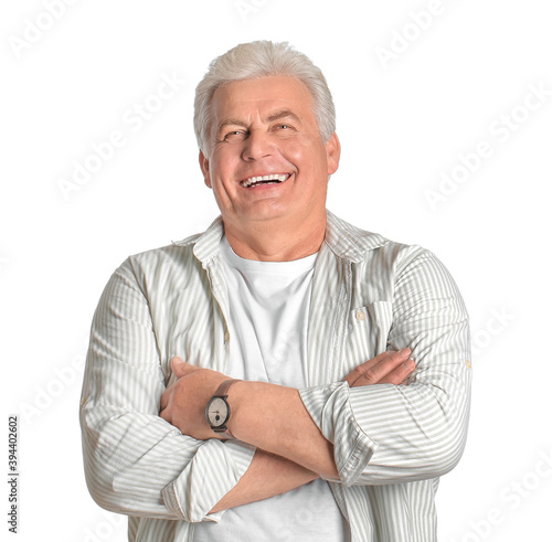 Happy senior man on white b...